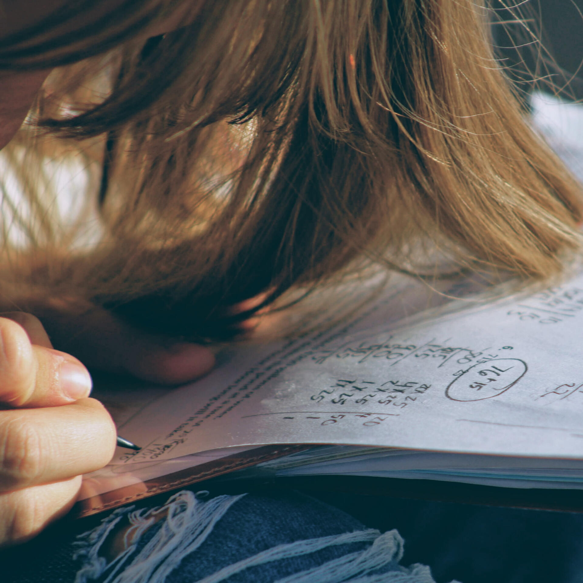 a young child practicing number operations